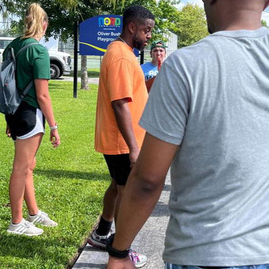 several people in the park attending the Lower 9 Fest